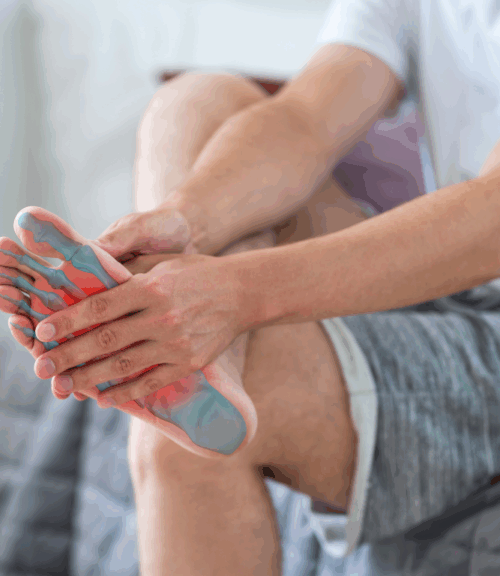 Plantar Fasciitis | Body First Wellness Center man touching feet