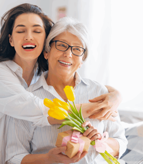 mothers day | Body First Wellness Center daughter hugging mother