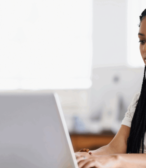 desk job solutions | Body First Wellness Center girl sitting in front of her computer
