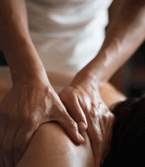 mastering-at-home-massage-tips | Body First Wellness Center Masseuse massaging client's shoulder